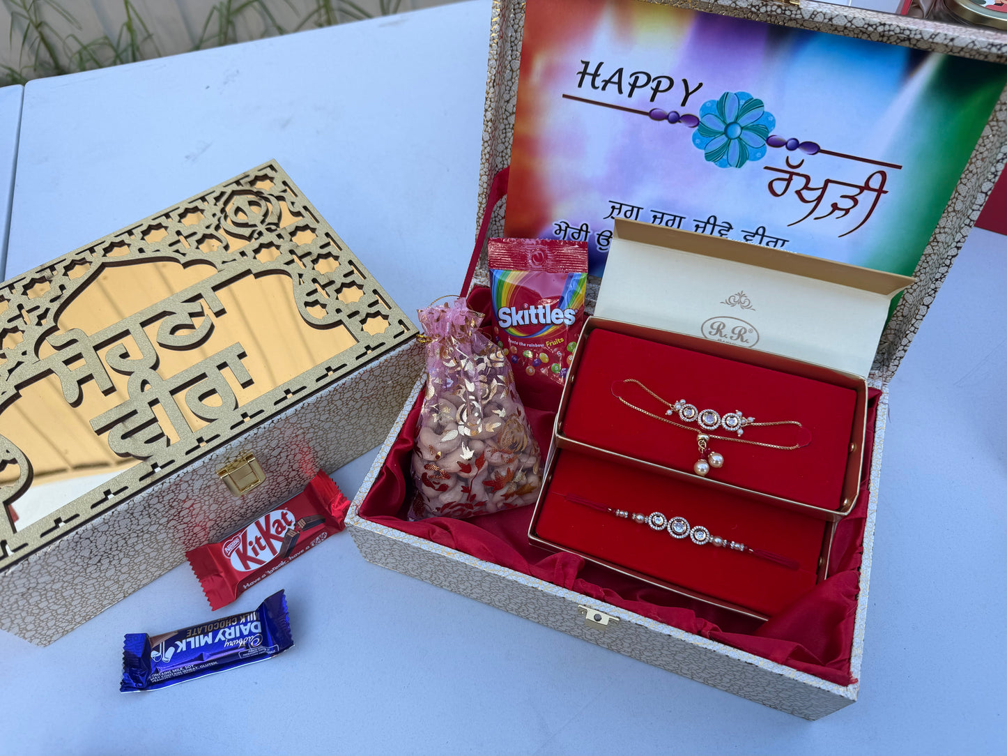 Golden Rakhi Hamper for Bro-Bhabi