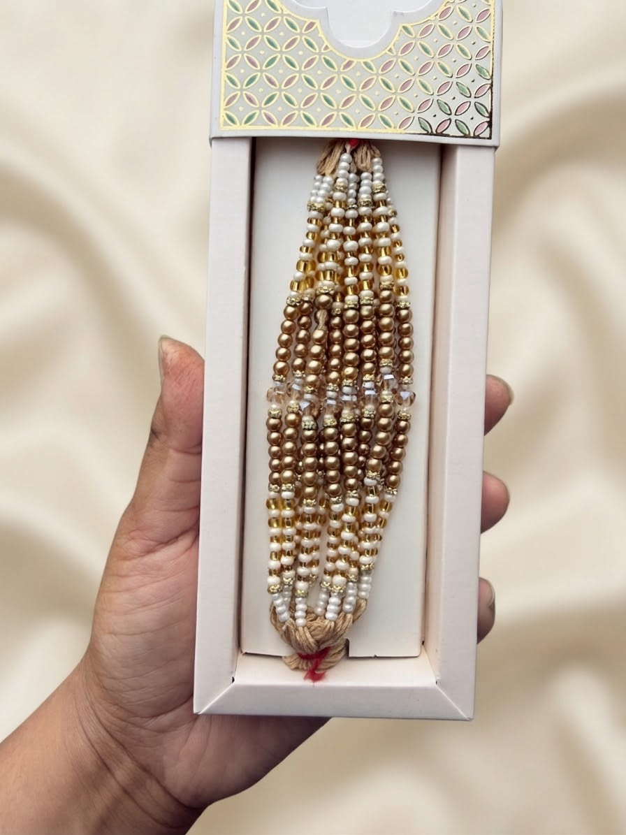 Golden rakhi threads (per pc)
