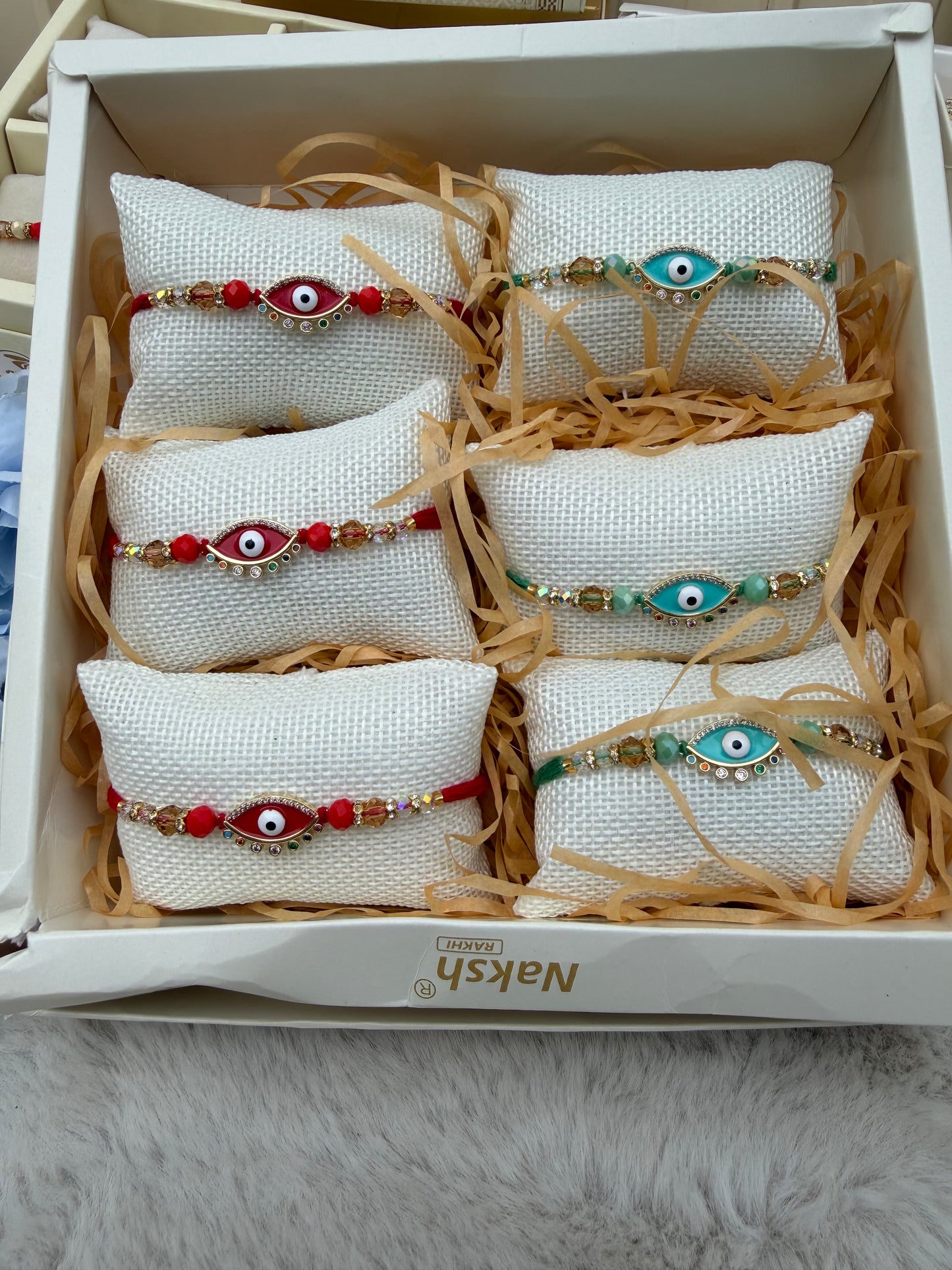Assorted colour Premium Cushion Evil Eye Rakhi