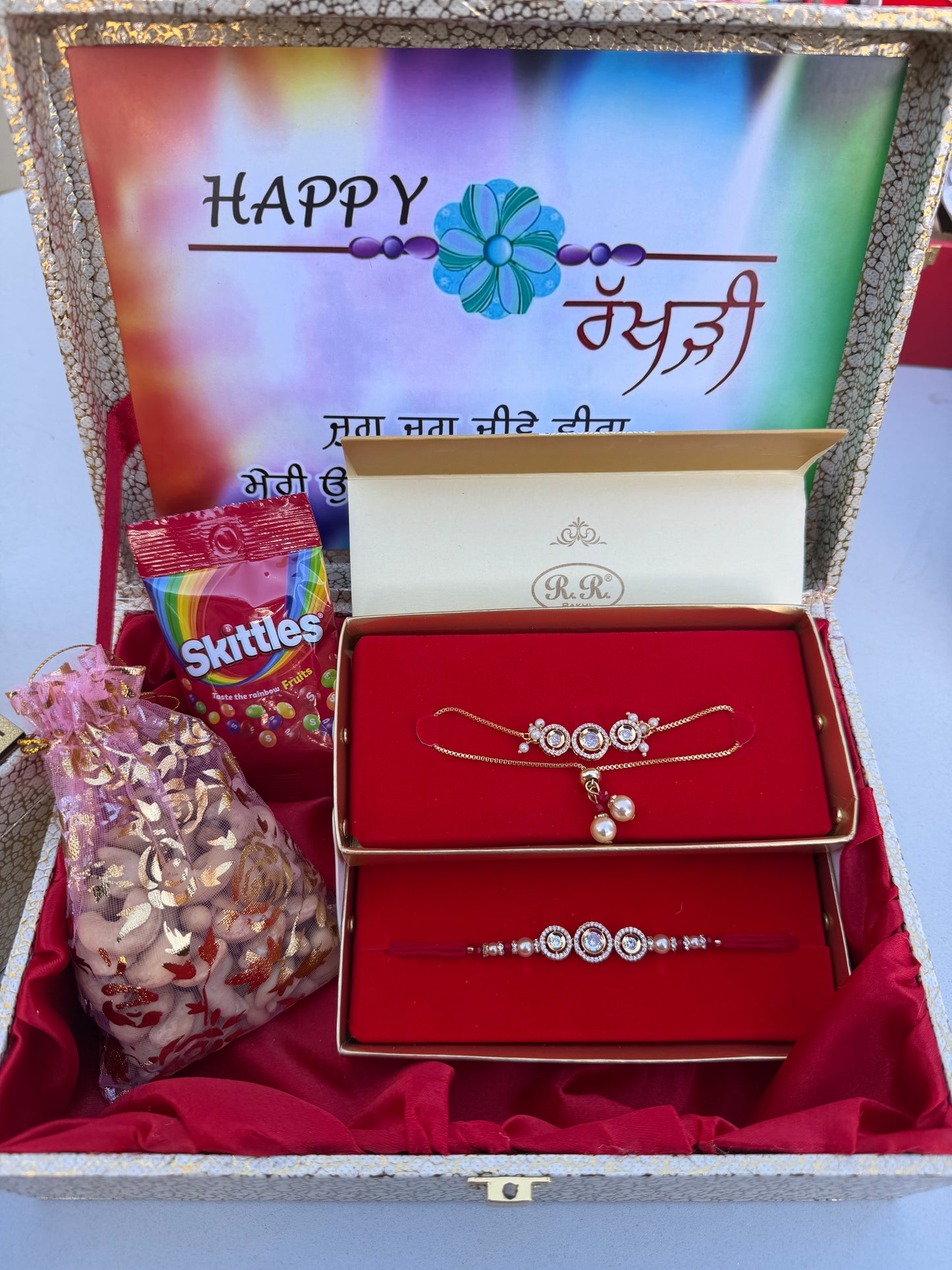 Golden Rakhi Hamper for Bro-Bhabi