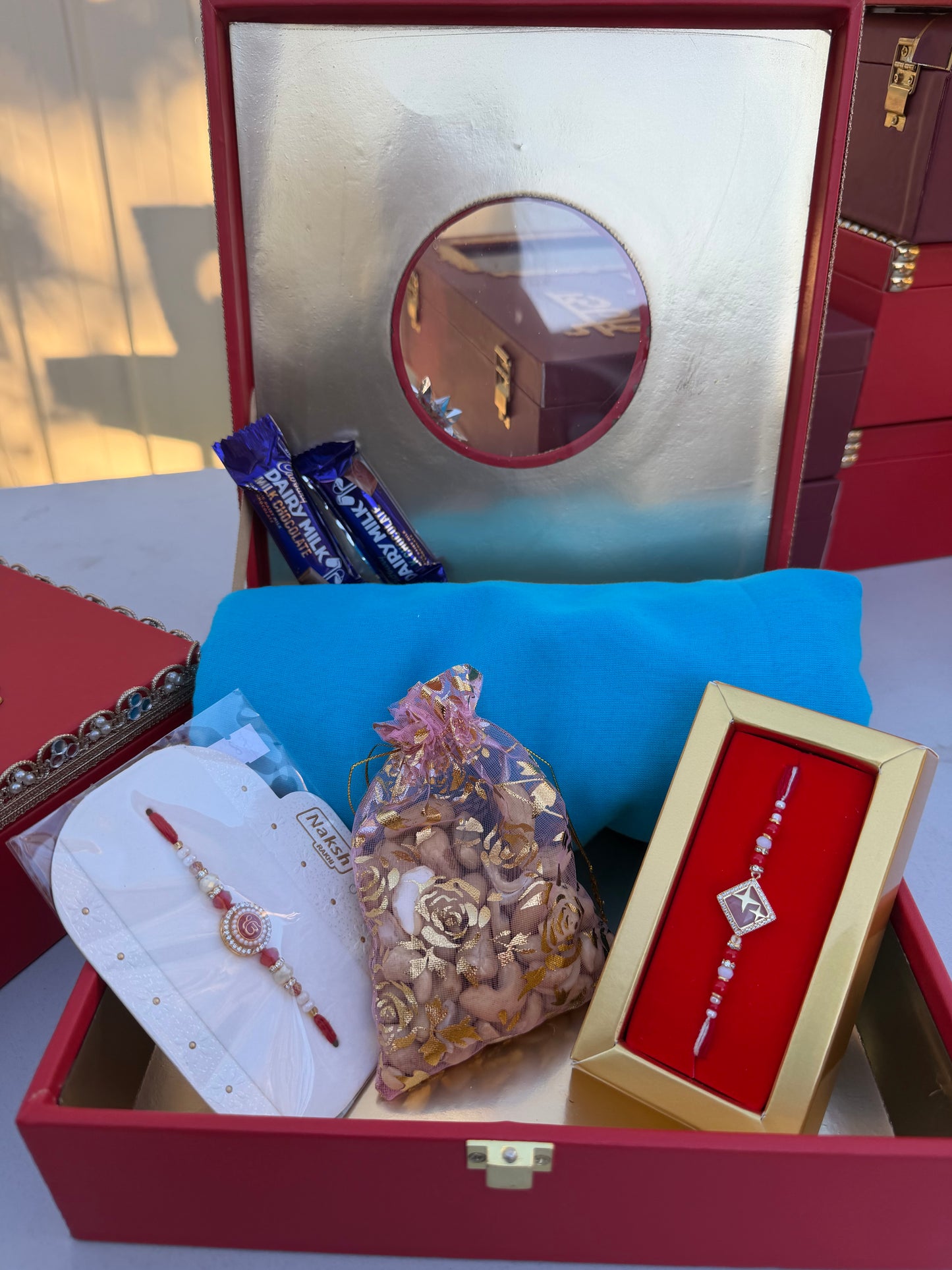 Rakhi Hamper for Bro includes (Turban, 2 Rakhies , nuts & choclate )