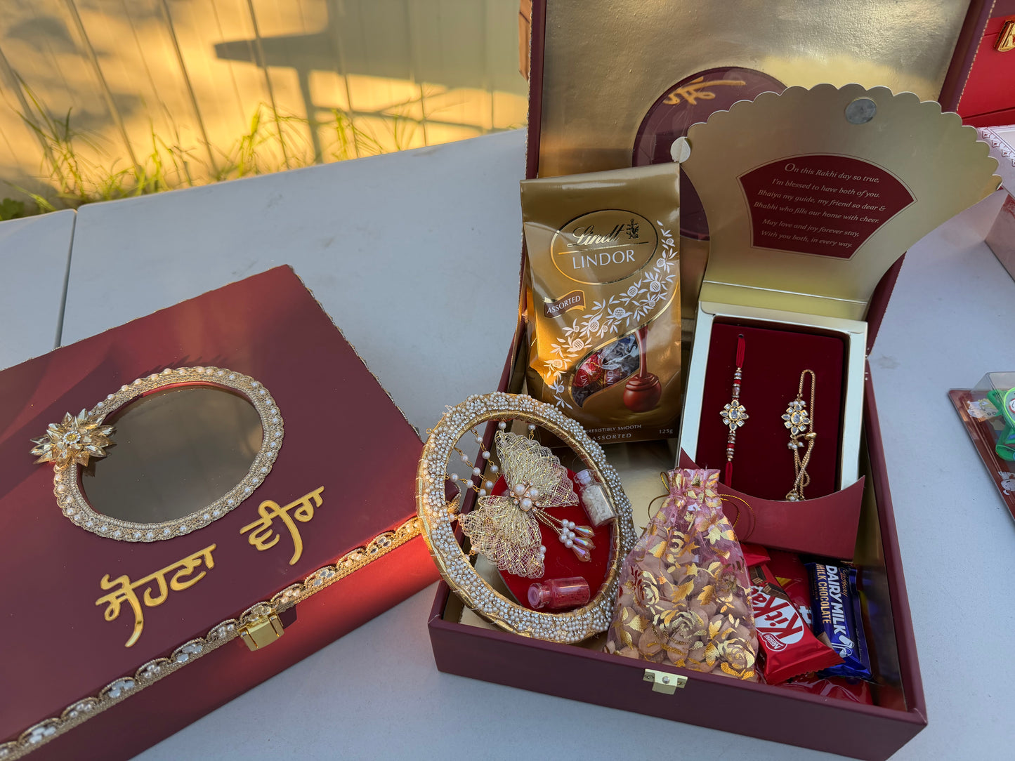 Sohna veera Rakhi Hamper Box (includes Bro-Bhabi combo set , Roli-Chawl thali , chocolate packing , nuts , chocolates & skittles )