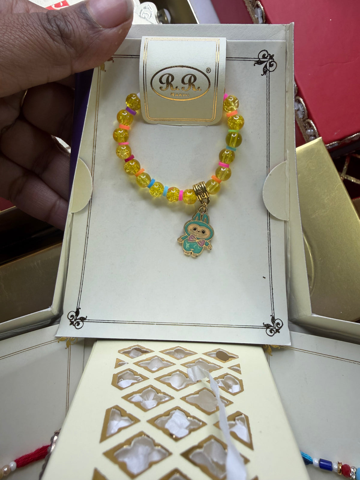 Family combo box (includes kids rakhi & bracelet, keyring , Bhabi bracelet & bro rakhi )